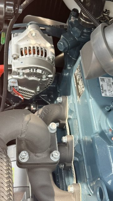 Kubota engine — alternator and manifold